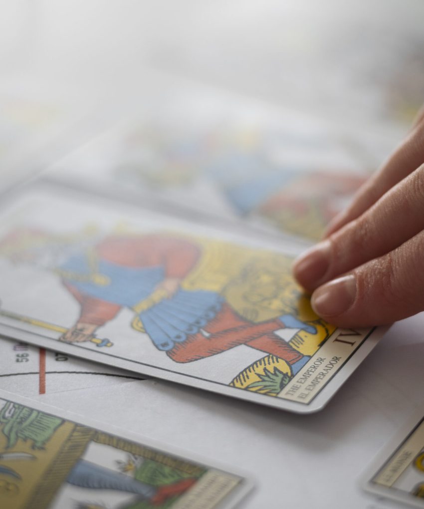 high-angle-woman-reading-tarot (1)